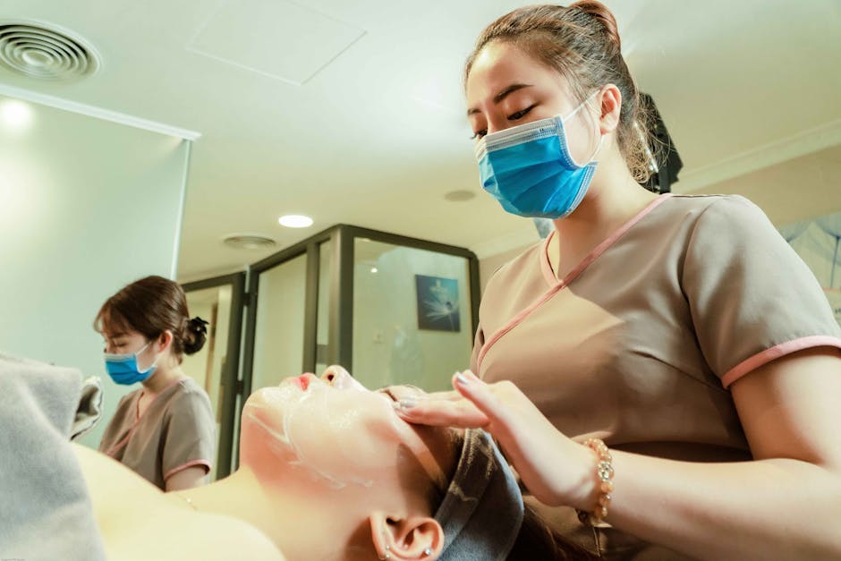 pexels photo 5042634 5042634 Women receiving facial treatments in a Hanoi spa, showcasing relaxation and wellness.